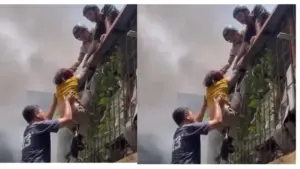 Hà Nội xảy ra cháy nhà cao tầng tại phường Văn Miếu - Quốc Tử Giám, người phụ nữ cùng hai cháu bé được lực lượng chức năng giải cứu an toàn.